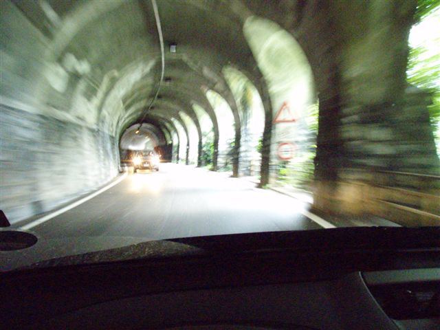 Italian Alps roadways, mostly in tunnels, 1.5 lanes
you flinch you lose
