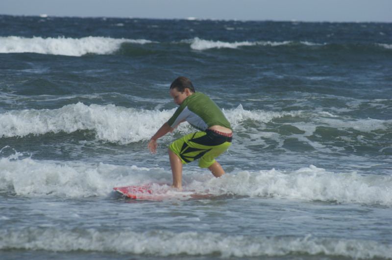 Scotty surfing Tribune Bay, Hornby Island (5'10" Quad surfboard)
