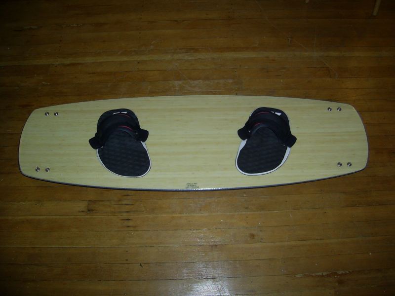 Bamboo Veneer w Straps
an eclectic mix...old Best straps, North pads, and Ocean Rodeo fins.
Keywords: custom kiteboard