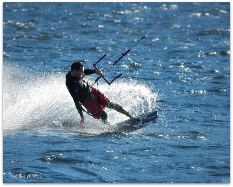 Scott shredding along in the windy inlet
Photos taken by Brenda and Russ Widdess of Pt Alberni, July 6/11
