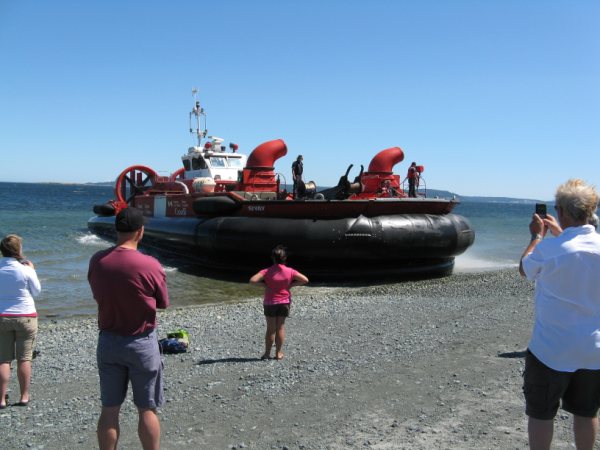 Hovercraft at Pipers
Had a visit from the Coast Guard at Pipers.  I guess there was an elderly lady on the beach with a medical situation during the bathtub race.  Someone had a marine VHF and could see the hovercraft at five fingers so he called them in.  They beat the ambulance by a good 10 minutes.

Sorry if this isn't the best place to put the photos.  Let me know if there is a better spot.
Keywords: pipers hovercraft