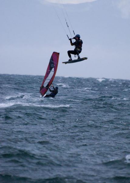 marty flying high
marty jumping at cook st, windsurfer in the background. 
Keywords: marty