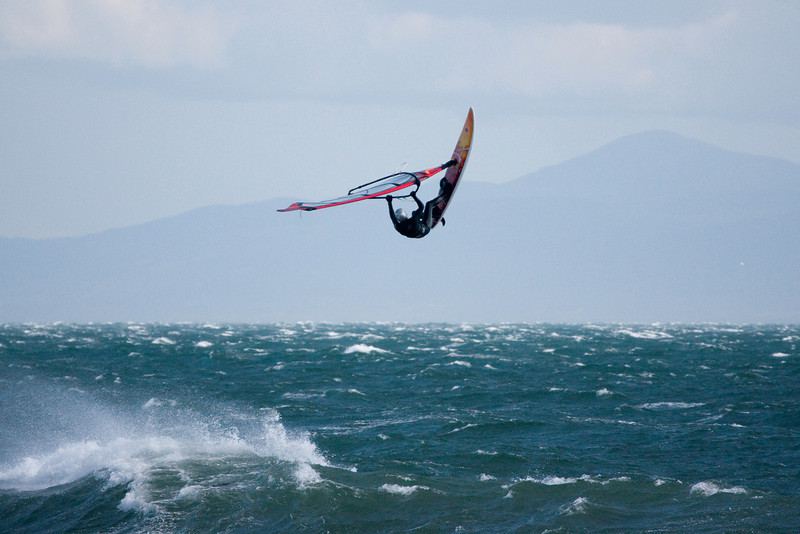 Shaggy trying to clear the Olympics....
There are other photos from this jump sequence that I like better as a photographer, but this is the one that best shows the height he got off that wave!
