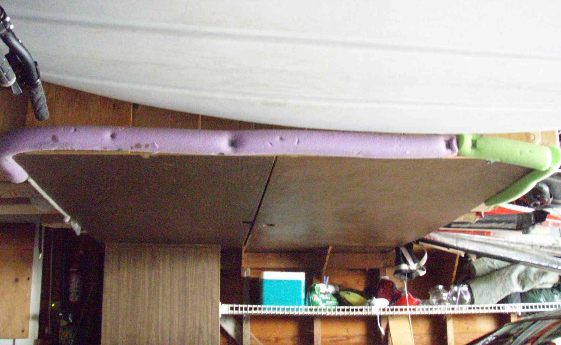 note car roof below, plywood supports, swim noodle noggin saver